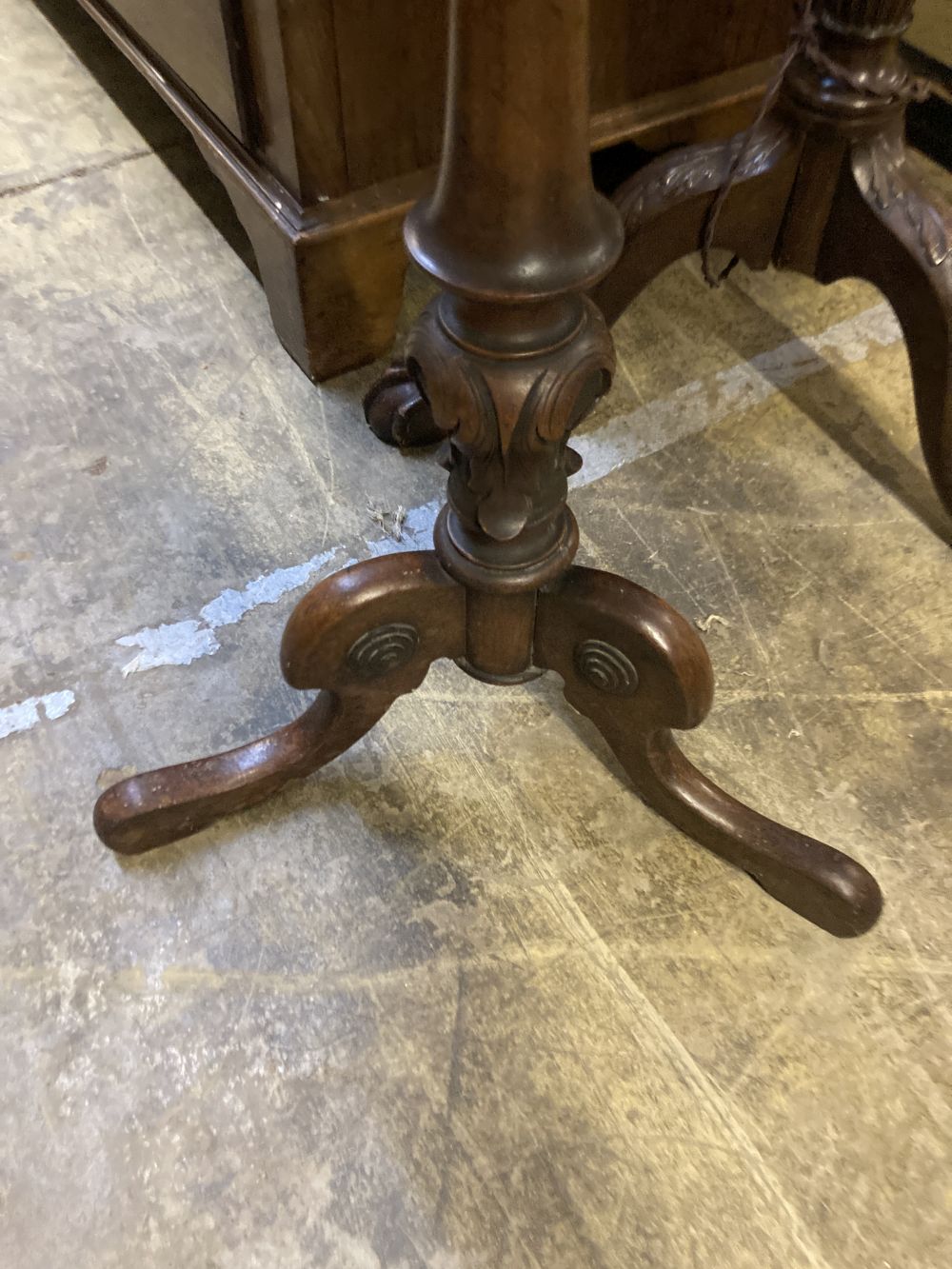 A Victorian mahogany tripod wine table, diameter 50cm height 70cm, together with a carved standard lamp